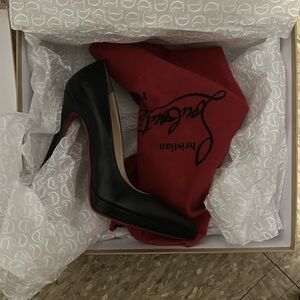 Christian Louboutin Red Sole Pumps